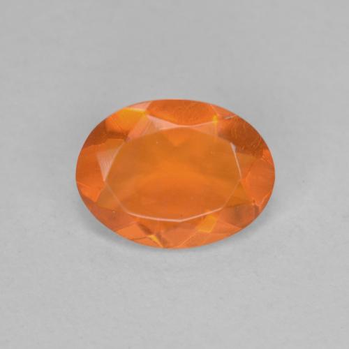 Ópalo de fuego naranja natural de 0,65 ct, corte óvalo, transparente