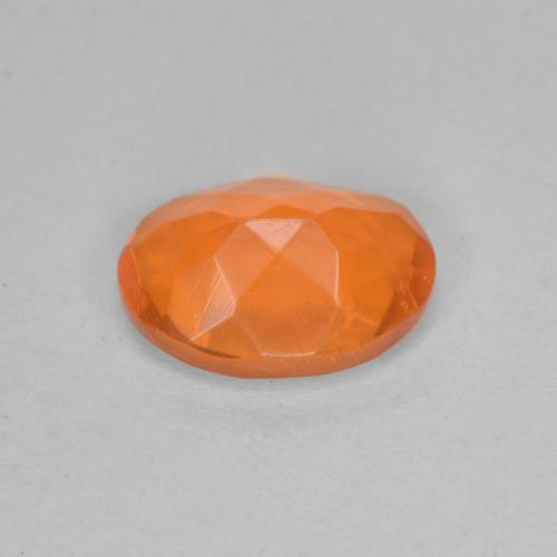 Ópalo de fuego naranja natural de 0,65 ct, corte óvalo, transparente