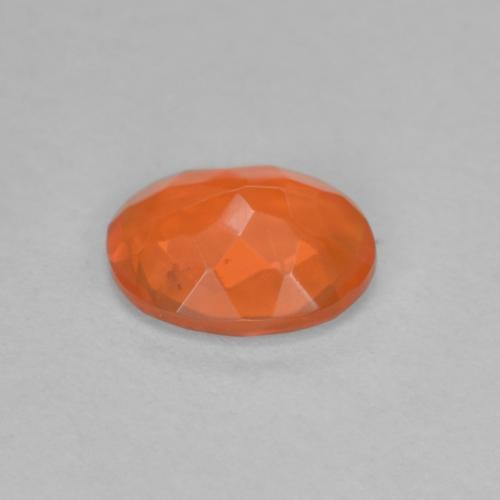Ópalo de fuego naranja natural de 0,56 ct, corte óvalo, transparente