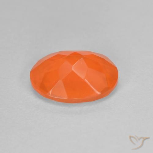Ópalo de fuego Naranja claro natural de 0.70 ct, Ovalada, Transparente