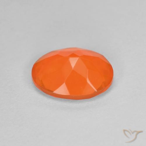 Ópalo de fuego Naranja medio natural de 0.67 ct, Ovalada, Transparente