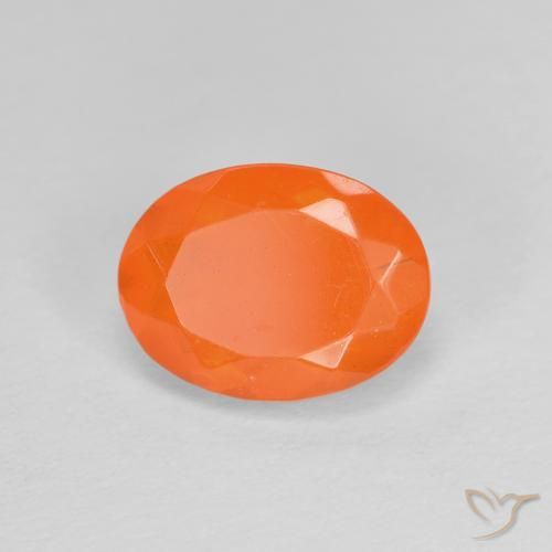 Ópalo de fuego Naranja medio natural de 0.79 ct, Ovalada, Transparente