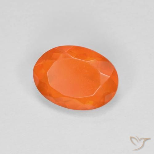 Ópalo de fuego Naranja medio natural de 0.68 ct, Ovalada, Transparente