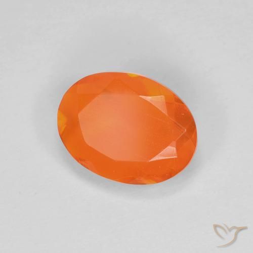 Ópalo de fuego Naranja rojizo natural de 0.81 ct, Ovalada, Transparente