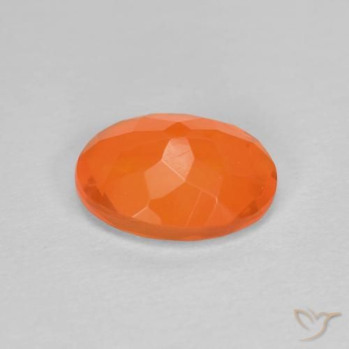 Ópalo de fuego Naranja rojizo natural de 0.81 ct, Ovalada, Transparente