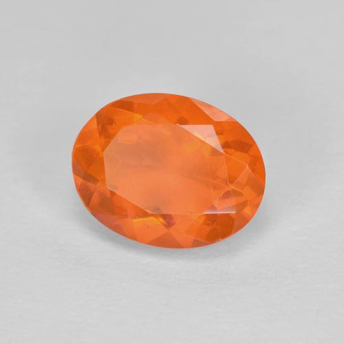 Ópalo de fuego naranja natural de 0,84 ct, corte óvalo, transparente