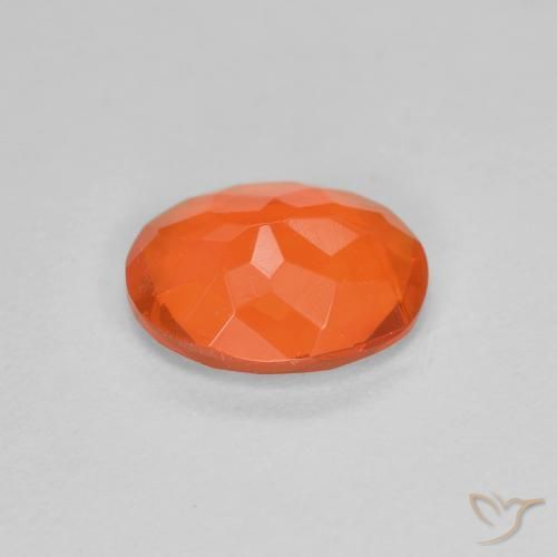 Ópalo de fuego Naranja claro natural de 0.56 ct, Ovalada, Transparente