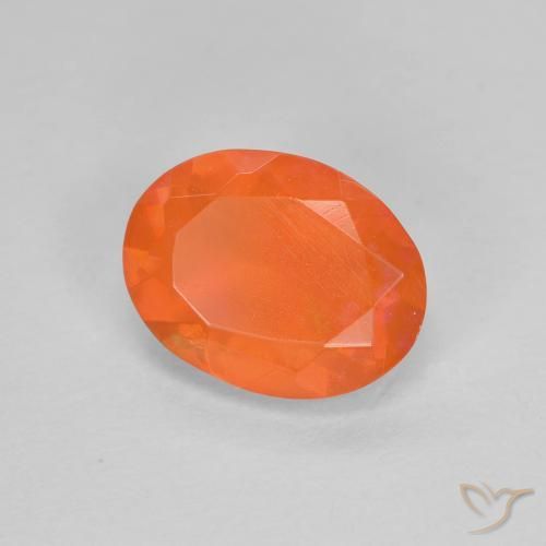 Ópalo de fuego Naranja claro natural de 0.68 ct, Ovalada, Transparente