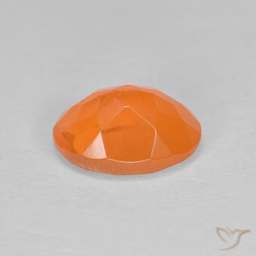 Ópalo de fuego Naranja rojizo natural de 0.83 ct, Ovalada, Translúcido