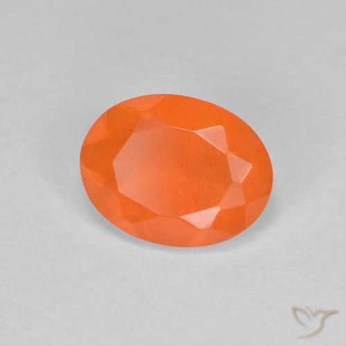 Ópalo de fuego Naranja medio natural de 0.69 ct, Ovalada, Translúcido