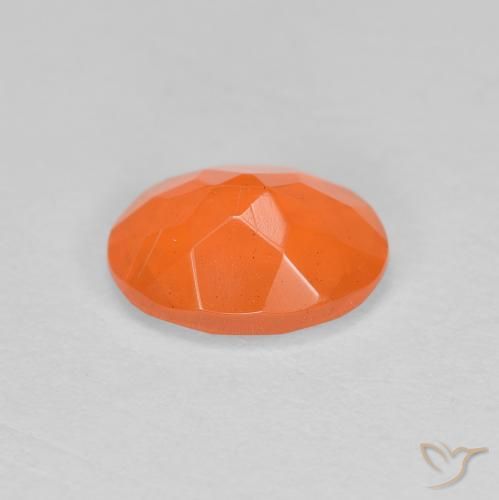 Ópalo de fuego Naranja medio natural de 0.69 ct, Ovalada, Translúcido