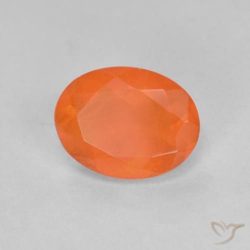 Ópalo de fuego Naranja medio natural de 0.68 ct, Ovalada, Translúcido