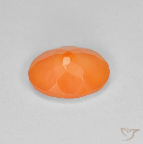 Ópalo de fuego Naranja rojizo natural de 0.70 ct, Ovalada, Translúcido