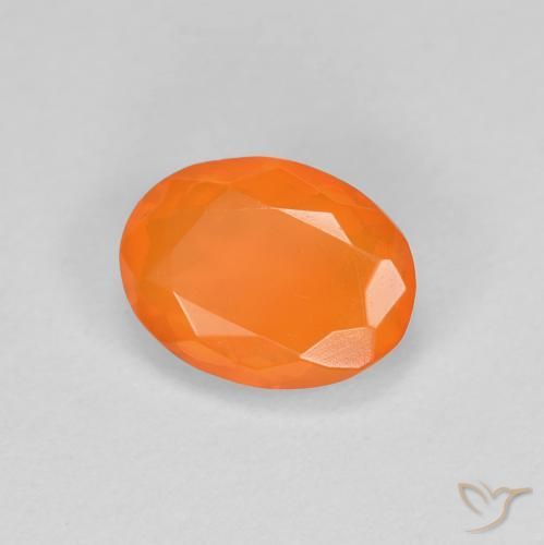 Ópalo de fuego Naranja rojizo natural de 0.67 ct, Ovalada, Translúcido