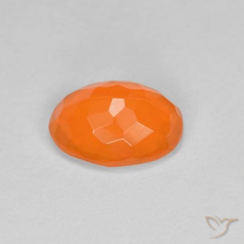 Ópalo de fuego Naranja rojizo natural de 0.67 ct, Ovalada, Translúcido