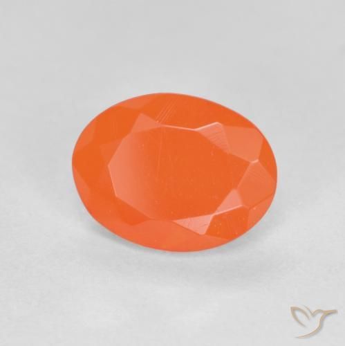 Ópalo de fuego Naranja claro natural de 0.69 ct, Ovalada, Translúcido