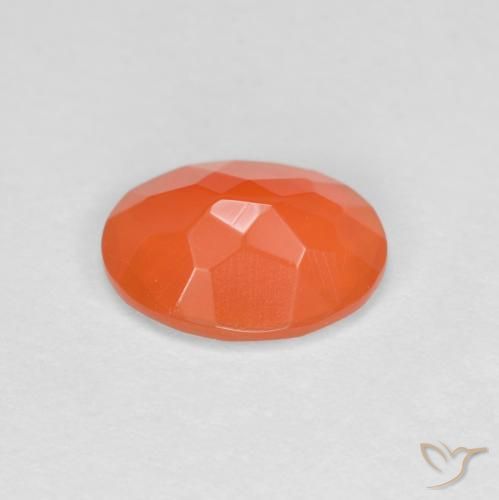 Ópalo de fuego Naranja intenso natural de 0.59 ct, Ovalada, Translúcido