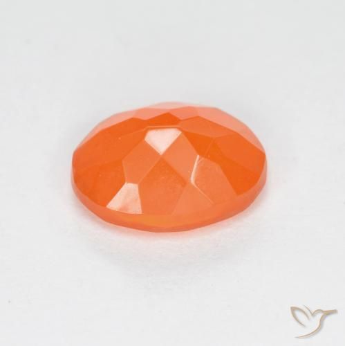 Ópalo de fuego Naranja rojizo natural de 0.69 ct, Ovalada, Translúcido
