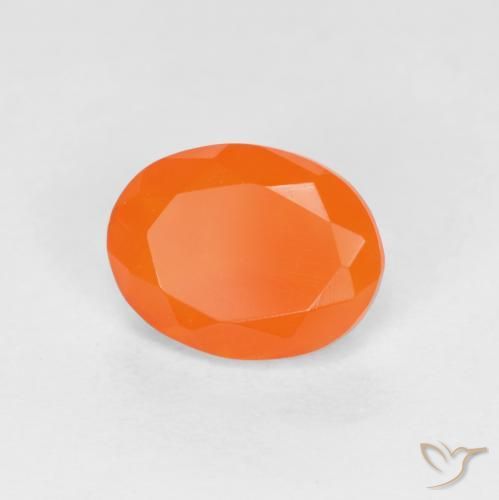 Ópalo de fuego Naranja intenso natural de 0.76 ct, Ovalada, Translúcido