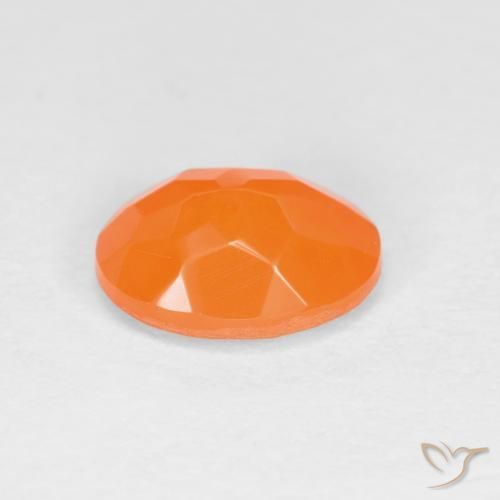 Ópalo de fuego Naranja intenso natural de 0.61 ct, Ovalada, Translúcido