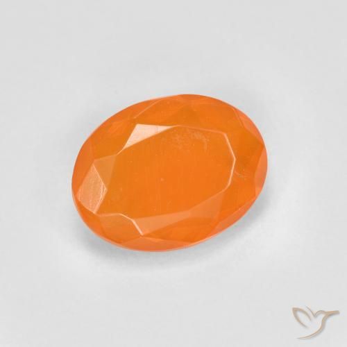 Ópalo de fuego Naranja melocotón vívido natural de 0.65 ct, Ovalada, Transparente