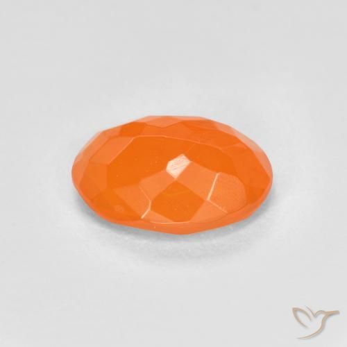 Ópalo de fuego Naranja melocotón vívido natural de 0.65 ct, Ovalada, Transparente