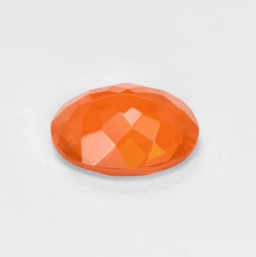 Ópalo de fuego naranja natural de 0,63 ct, corte óvalo, transparente