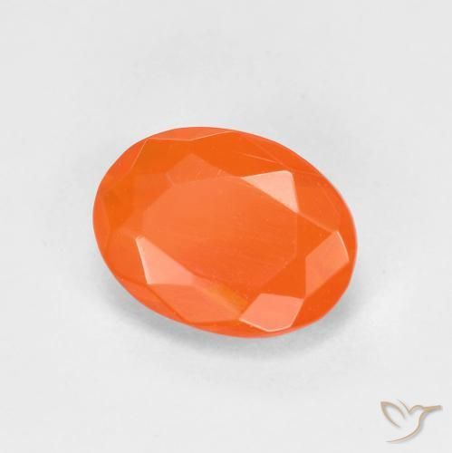 Ópalo de fuego Naranja claro natural de 0.65 ct, Ovalada, Transparente