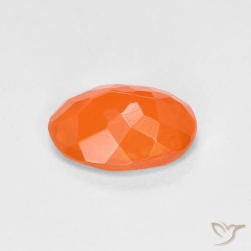 Ópalo de fuego Naranja claro natural de 0.65 ct, Ovalada, Transparente