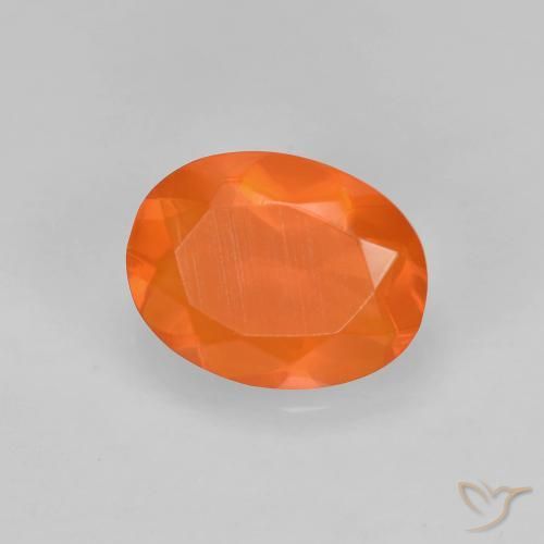 Ópalo de fuego Naranja medio natural de 0.65 ct, Ovalada, Transparente