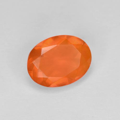 Ópalo de fuego naranja natural de 0,67 ct, corte óvalo, transparente