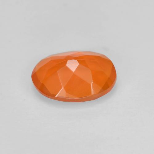 Ópalo de fuego naranja natural de 0,67 ct, corte óvalo, transparente