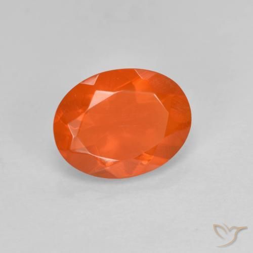 Ópalo de fuego Naranja claro natural de 0.65 ct, Ovalada, Transparente