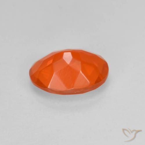 Ópalo de fuego Naranja claro natural de 0.65 ct, Ovalada, Transparente