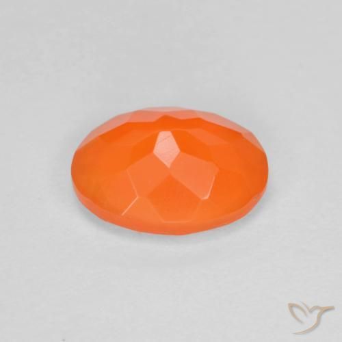 Ópalo de fuego Naranja rojizo natural de 0.70 ct, Ovalada, Transparente