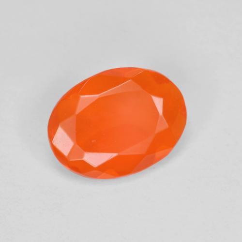 Ópalo de fuego naranja natural de 0,53 ct, corte óvalo, transparente