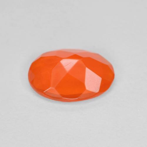 Ópalo de fuego naranja natural de 0,53 ct, corte óvalo, transparente