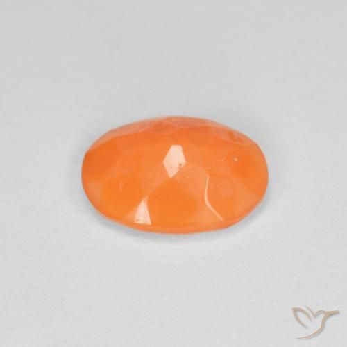 Ópalo de fuego Naranja medio natural de 0.59 ct, Ovalada, Transparente
