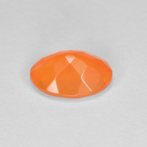 Ópalo de fuego naranja natural de 0,69 ct, corte óvalo, transparente