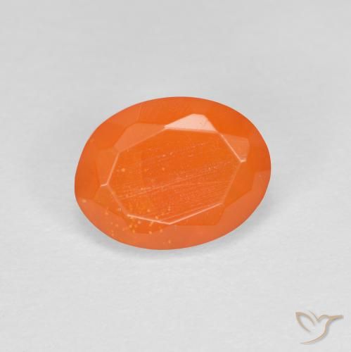 0.67ct Natural Naranja intenso Ópalo de fuego, Ovalada, Transparente