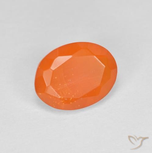 Ópalo de fuego Naranja intenso natural de 0.67 ct, Ovalada, Transparente