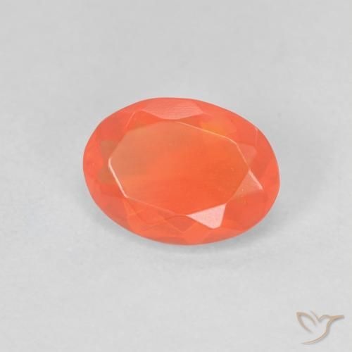 Ópalo de fuego Naranja claro natural de 0.63 ct, Ovalada, Transparente
