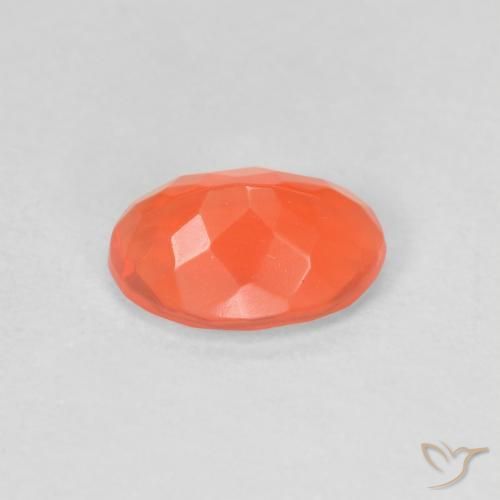 Ópalo de fuego Naranja claro natural de 0.63 ct, Ovalada, Transparente