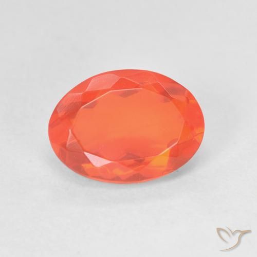 Ópalo de fuego Naranja claro natural de 1.48 ct, Corte Óvalo, Transparente