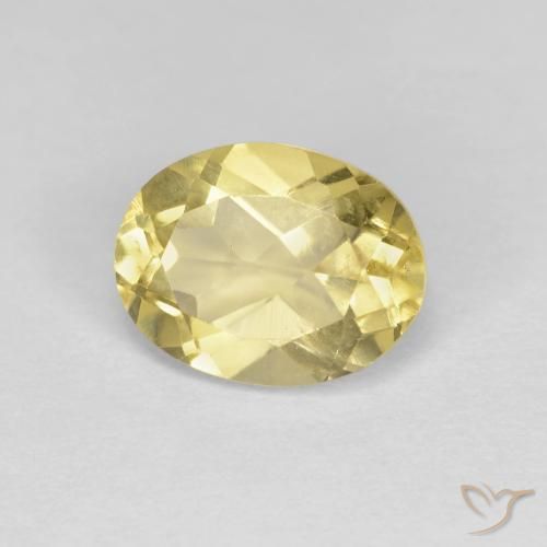 Berilo dorado Amarillo terroso claro natural de 1.38 ct, Ovalada, VS