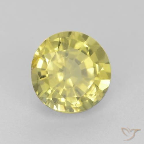 Granate grosularita Amarillo claro medio natural de 0.60 ct, Redondo, VS
