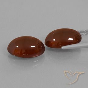 Gemas de granate hessonita Marrón oscuro medio natural de 12.22 ct, Ovalada, Translúcido