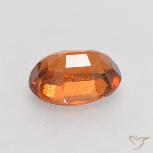 granate hessonita Naranja oscuro medio natural de 1.37 ct, Ovalada, VS-SI