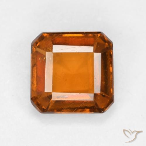 1.25ct Natural Naranja oscuro medio granate hessonita, corte esmeralda, VS