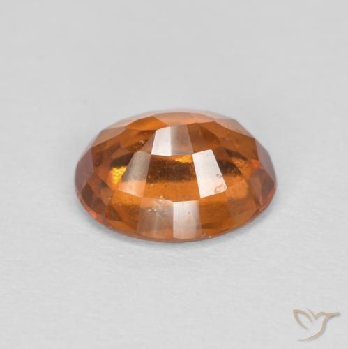 granate hessonita Naranja amarillento natural de 1.56 ct, Ovalada, VS